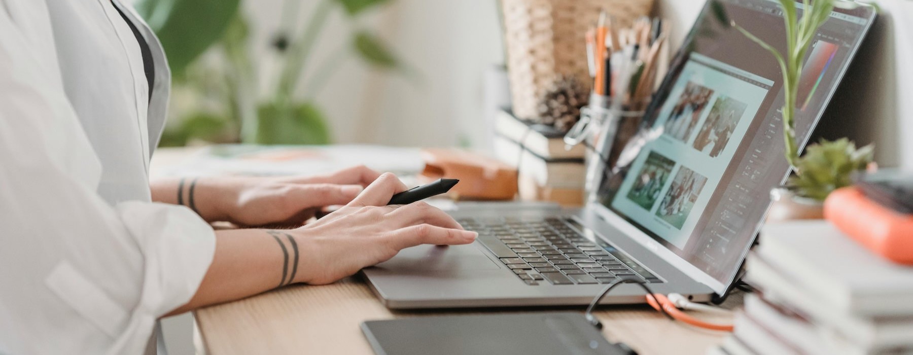 a person typing on a laptop