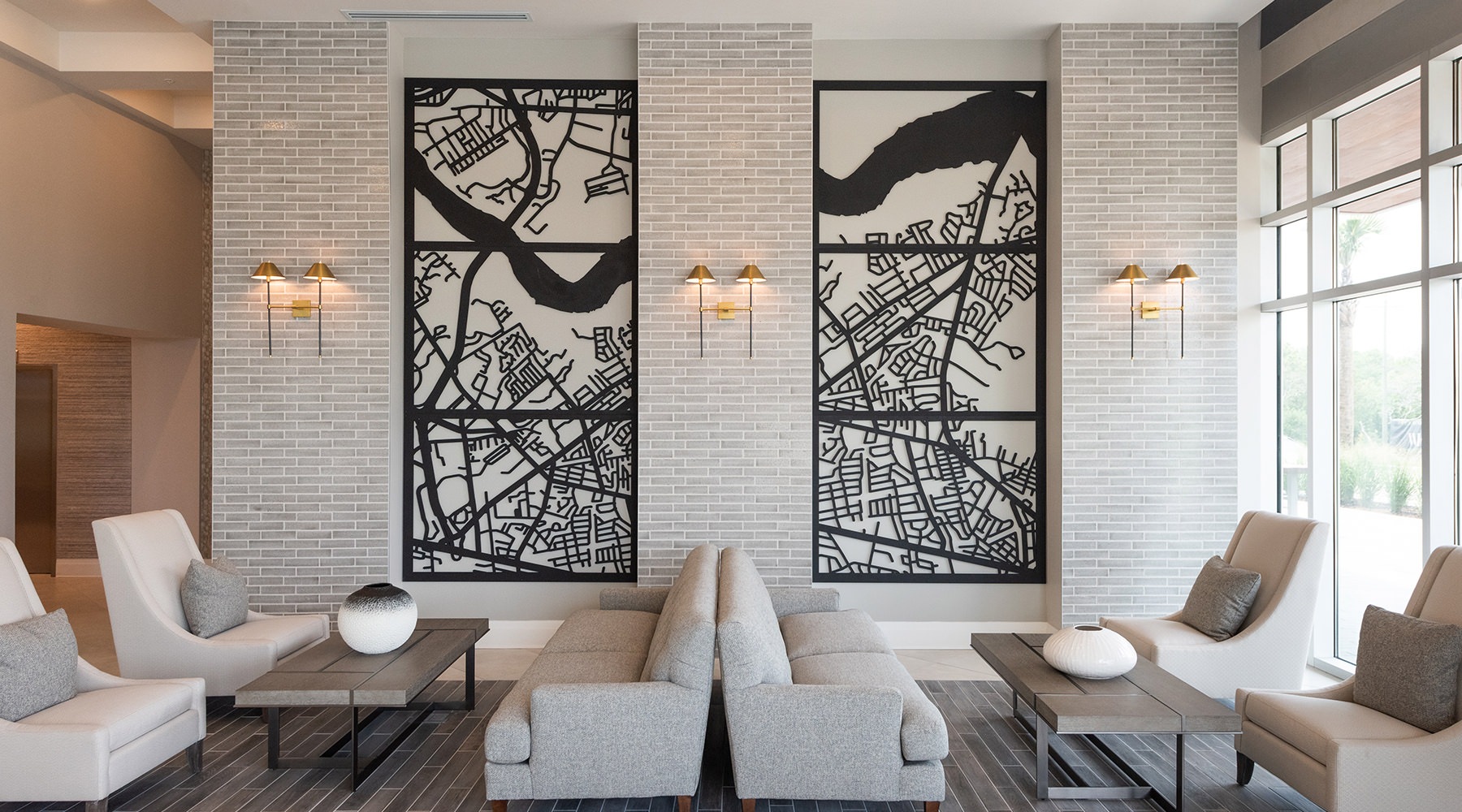 Spacious well lit lounge area with multiple tables for seating